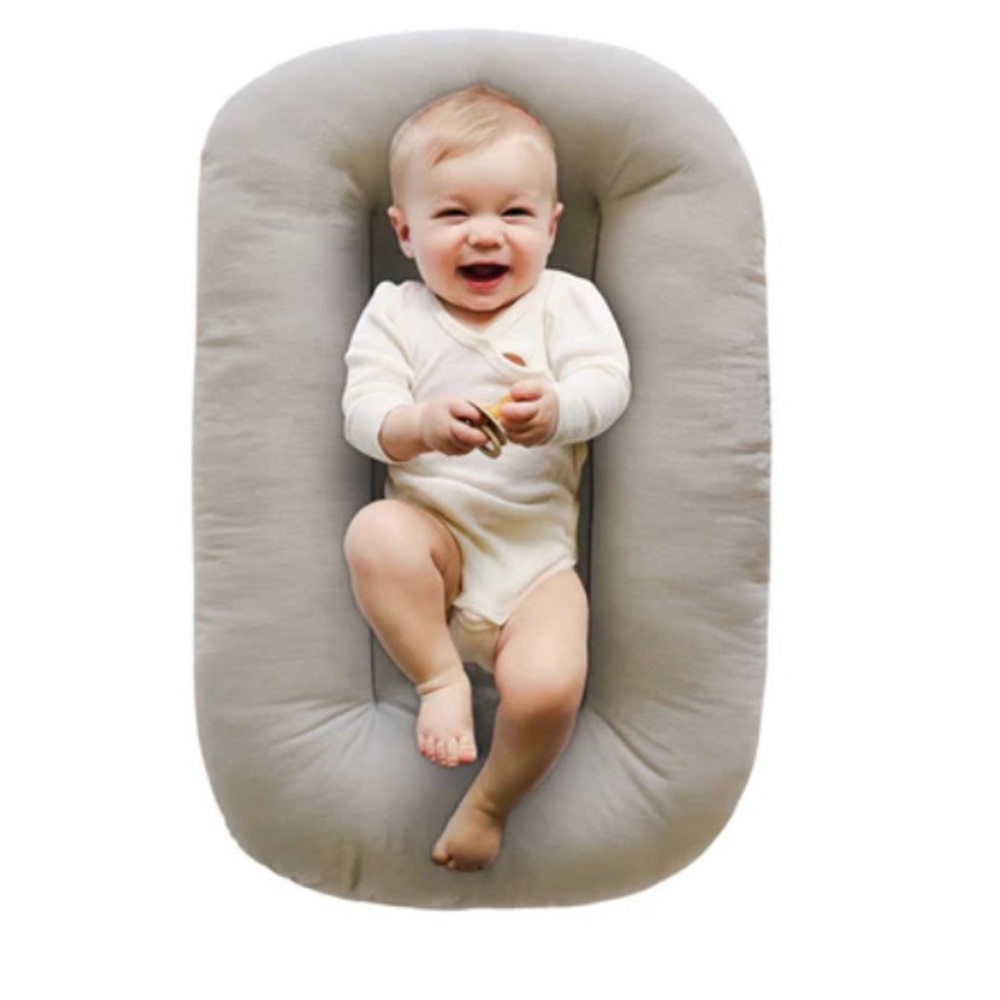Snuggle Me infant lounger